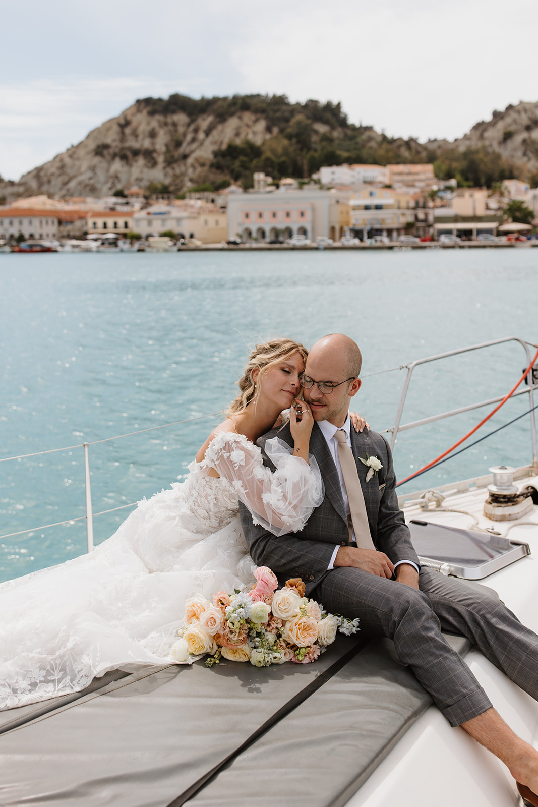 an intimate destination wedding in Zakynthos, Greece. Janessa and Jorick celebrated their love with a stunning seaside ceremony, a dreamy sailboat portrait session, and a beautiful Greek reception. Experience the magic of destination wedding photography in Greece